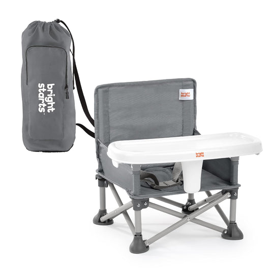 Bright Starts Pop 'N Sit portable booster seat for toddlers with carrying bag and removable tray.