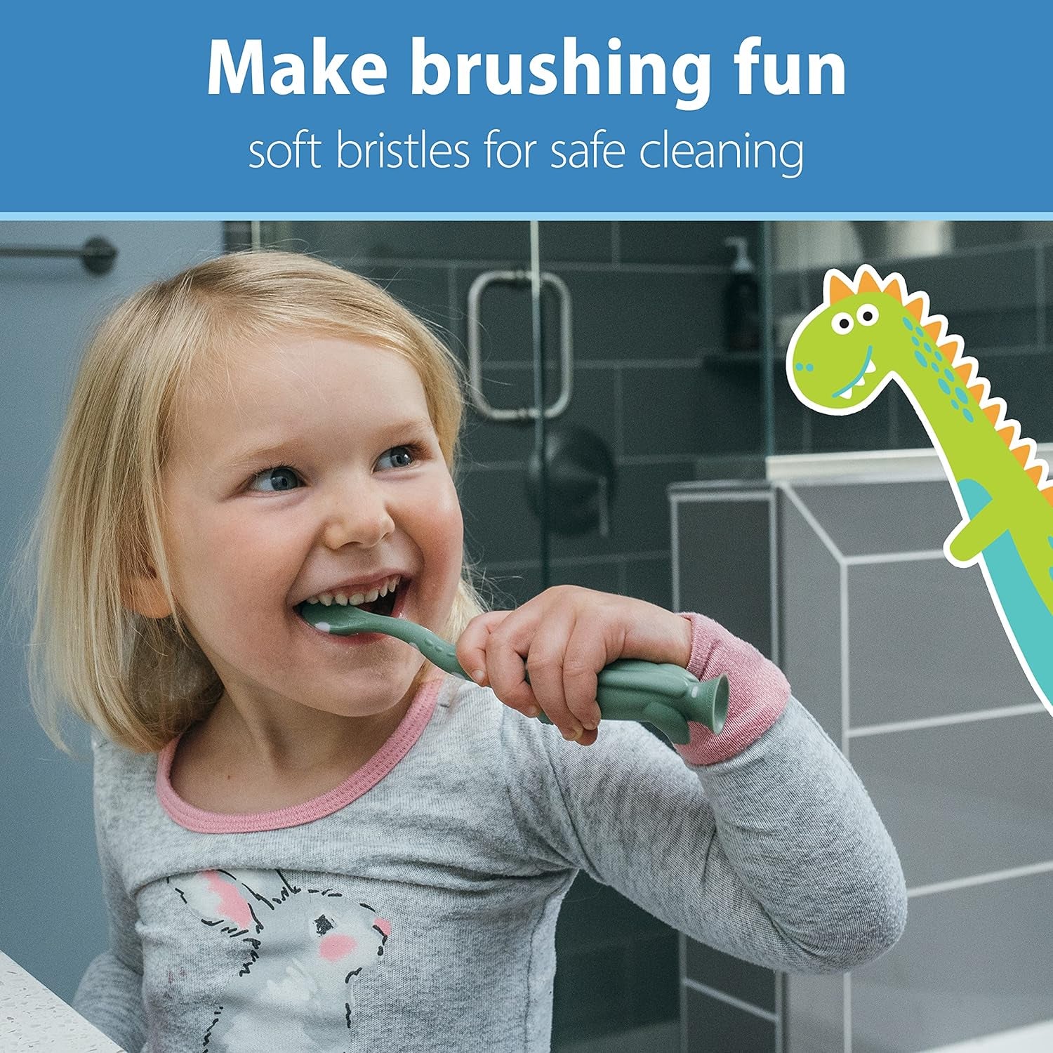 Toddler using dinosaur toothbrush 2-pack with soft bristles for safe cleaning and fun brushing experience.
