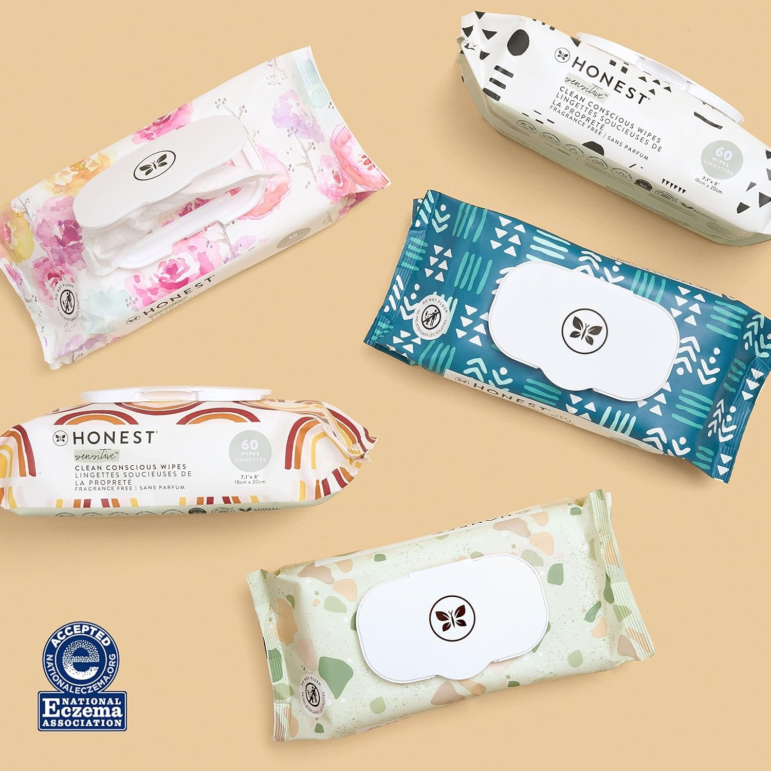 Assorted The Honest Company baby wipes featuring hypoallergenic baby wipes for sensitive skin in colorful packaging.