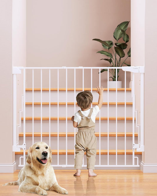 Child standing by Cumbor 34" extra tall baby gate for stairs, with a dog sitting in front, showcasing safety in homes.
