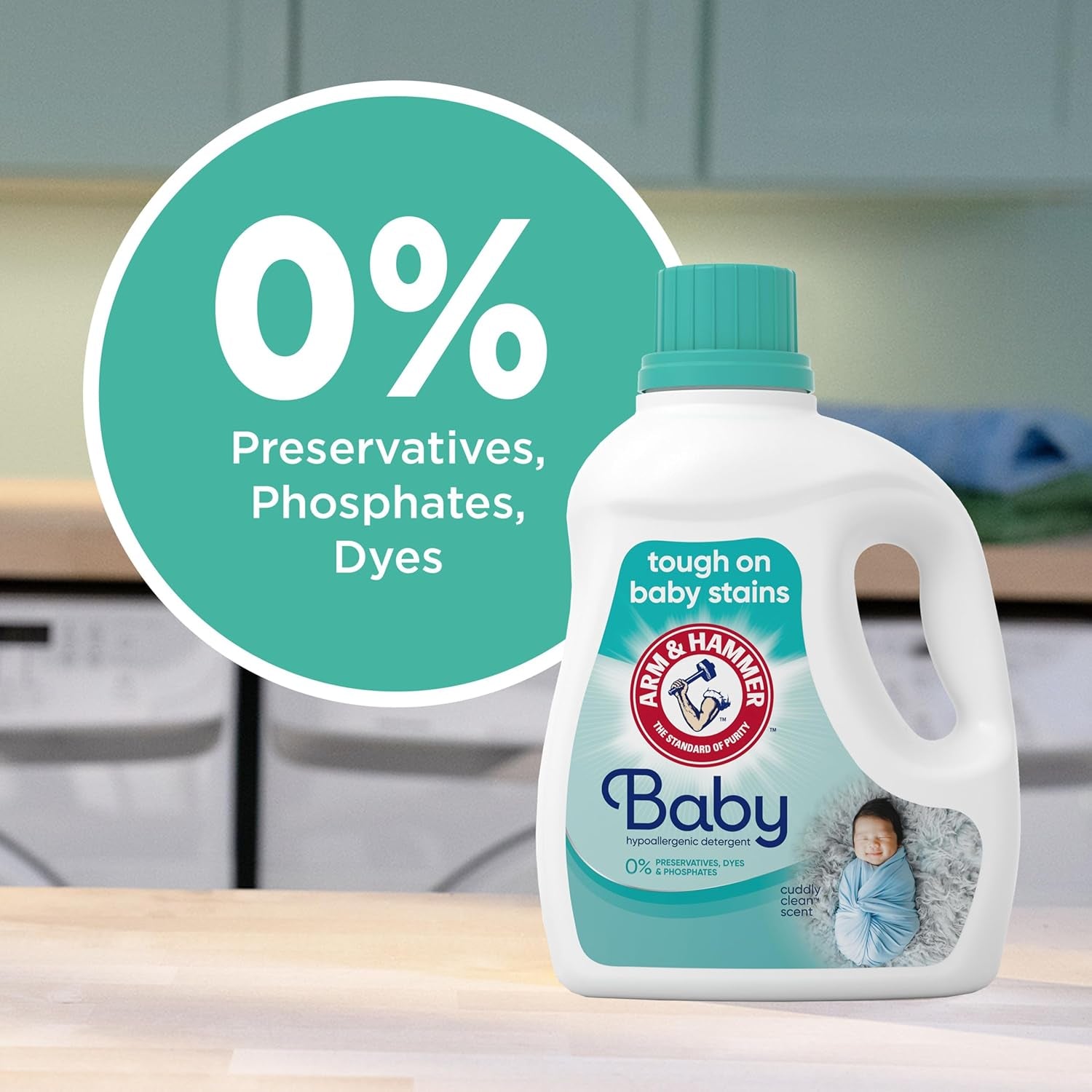 Hypoallergenic baby laundry detergent bottle highlighting 0% preservatives, phosphates, dyes, effective on baby stains.